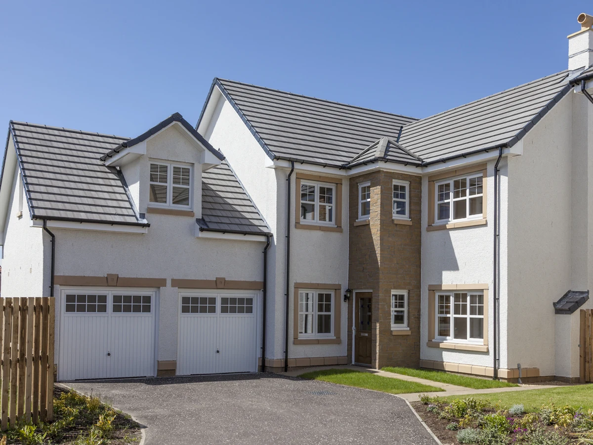 Exterior painting of a large white rendered house in Spennymoor by Durham Painters
