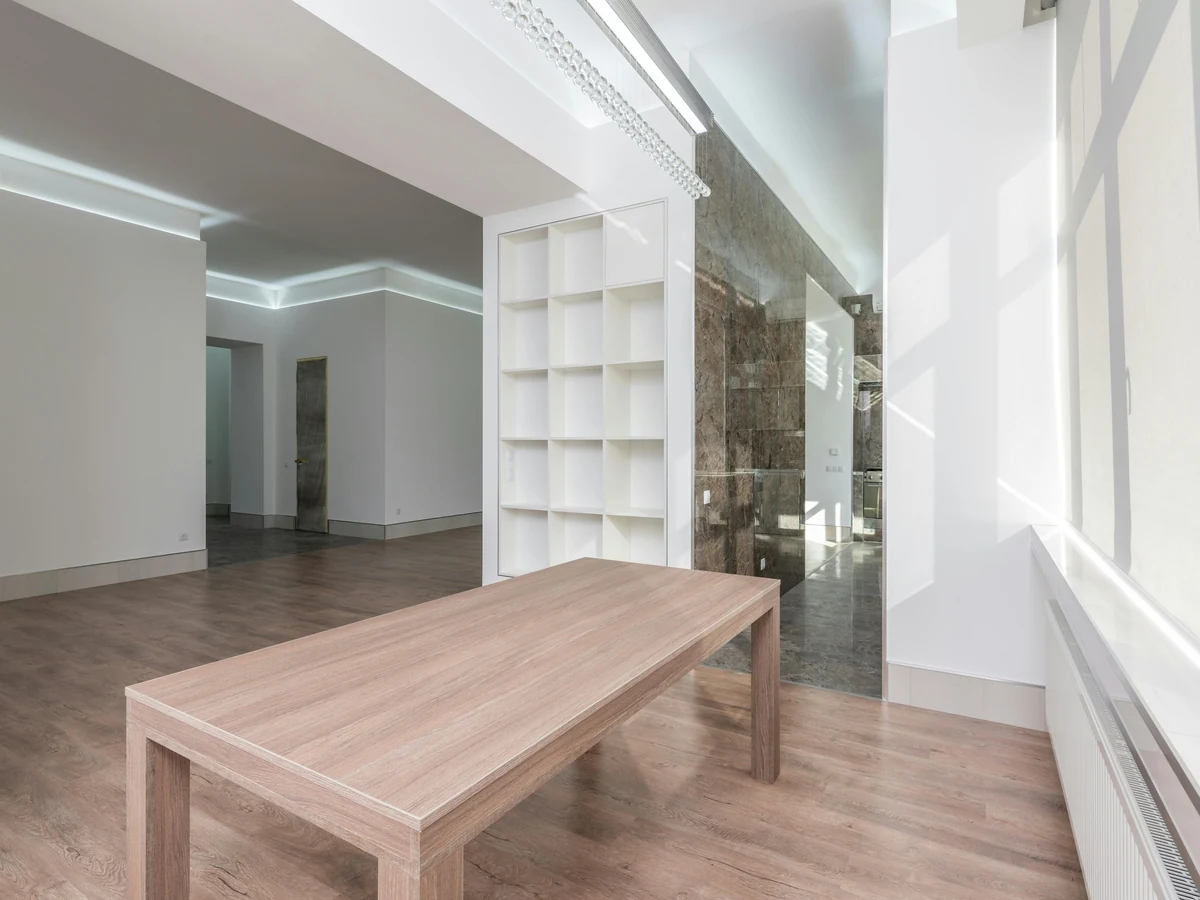Interior painting in Pelton Fell by Durham Painters, freshly decorated empty room with wooden flooring