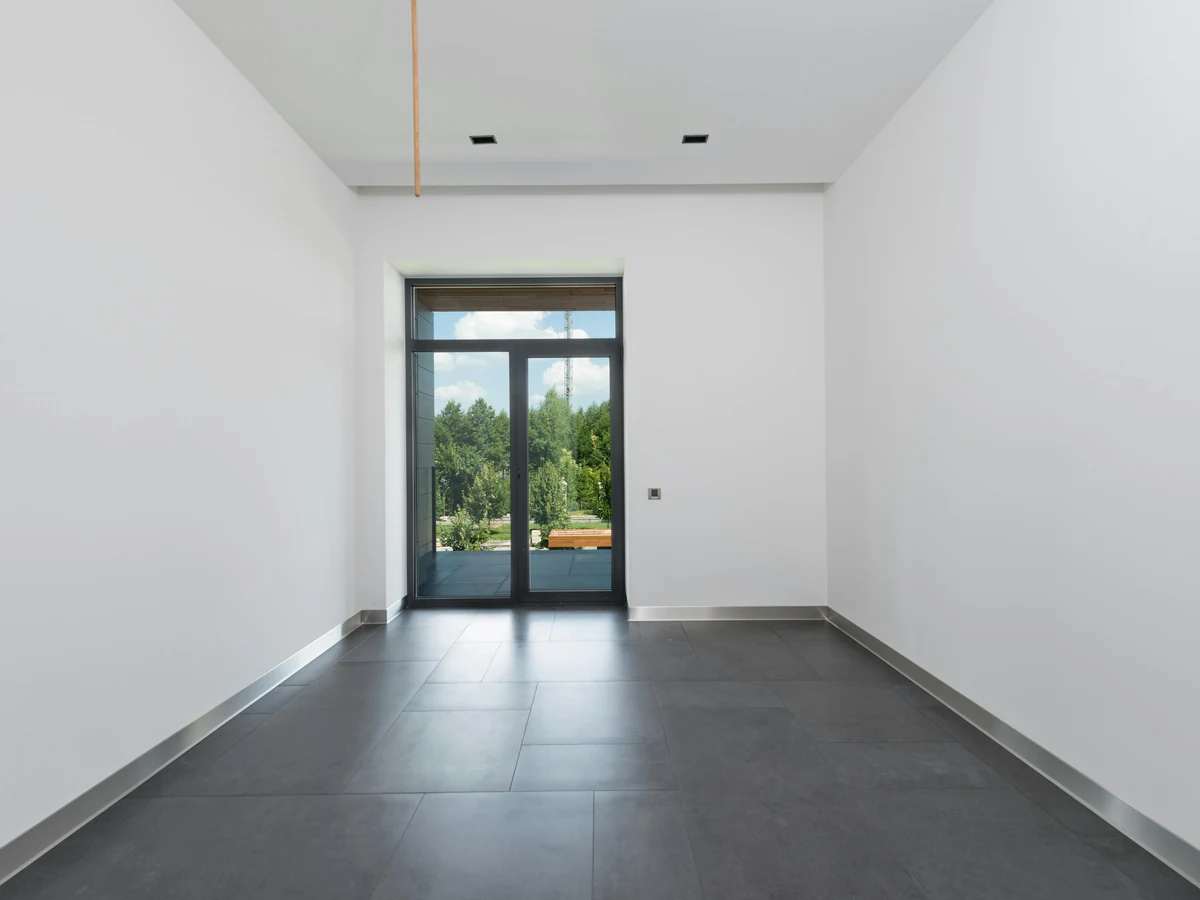 Interior painting of an empty white room in Willington by Durham Painters